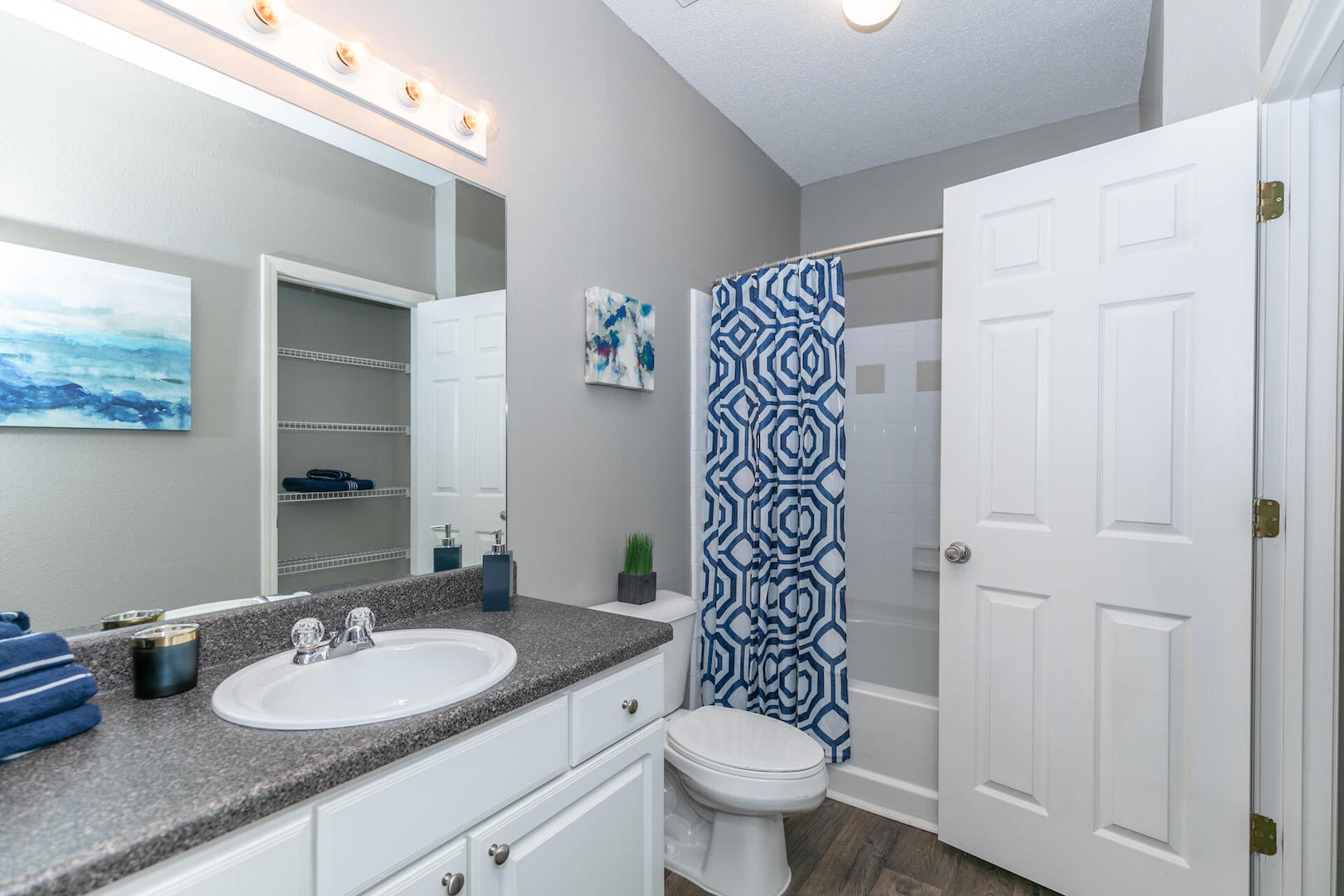 Bathroom with white under cabinets