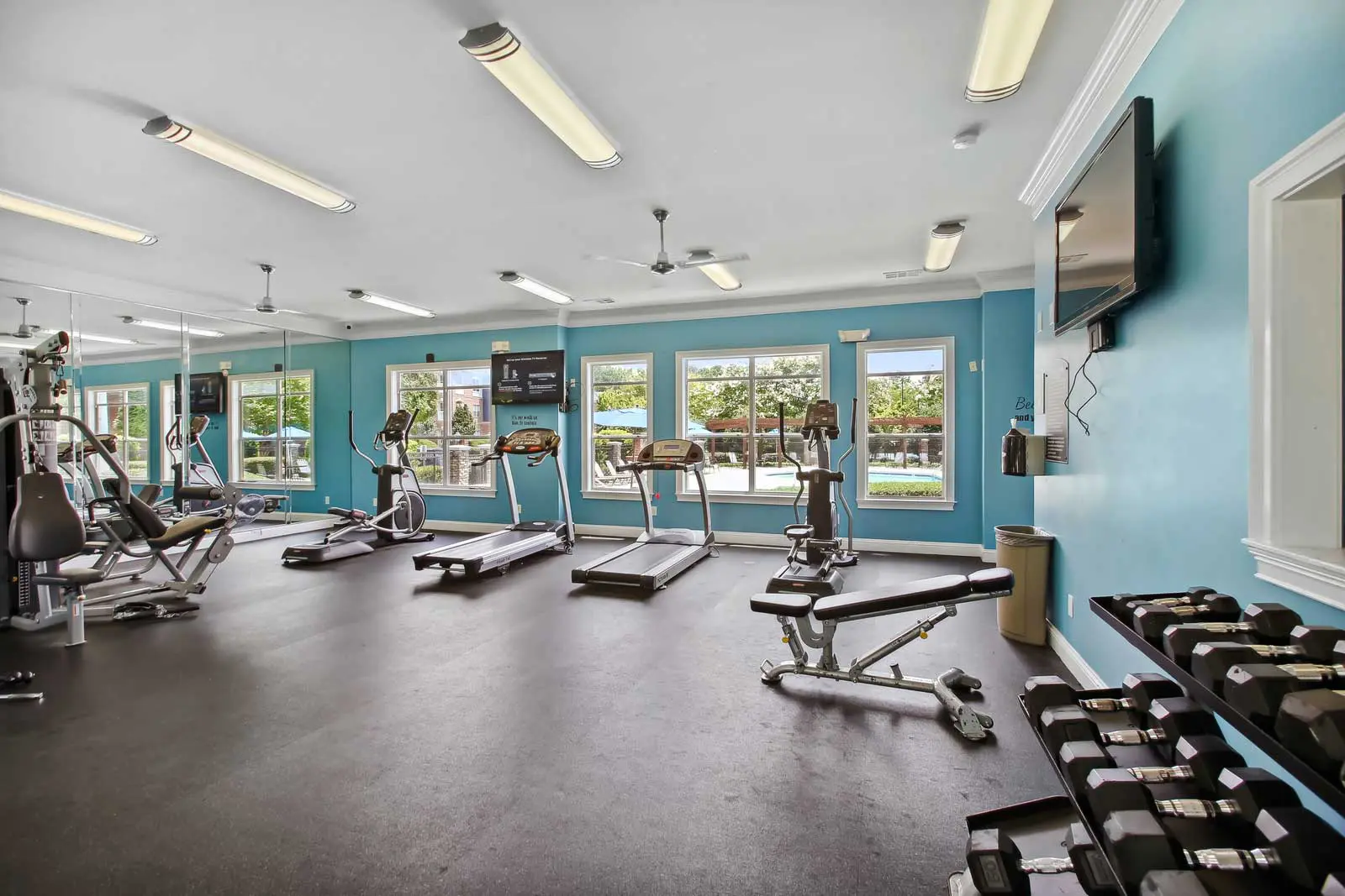 Fitness center with cardio equipment and free weights