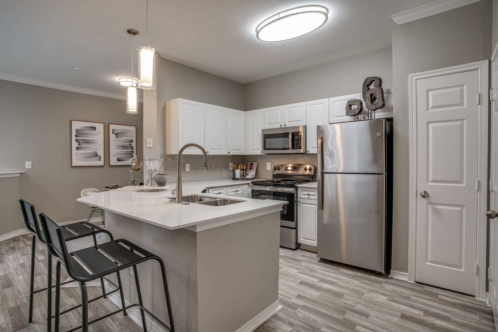 Open kitchen with stainless steel appliances