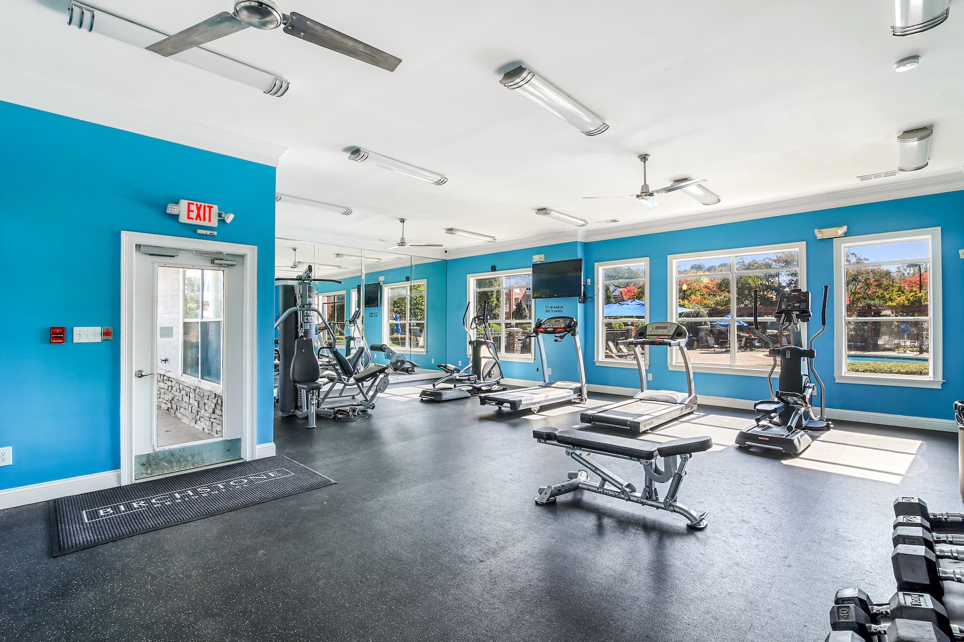 Complex fitness center with weight lifting equipment